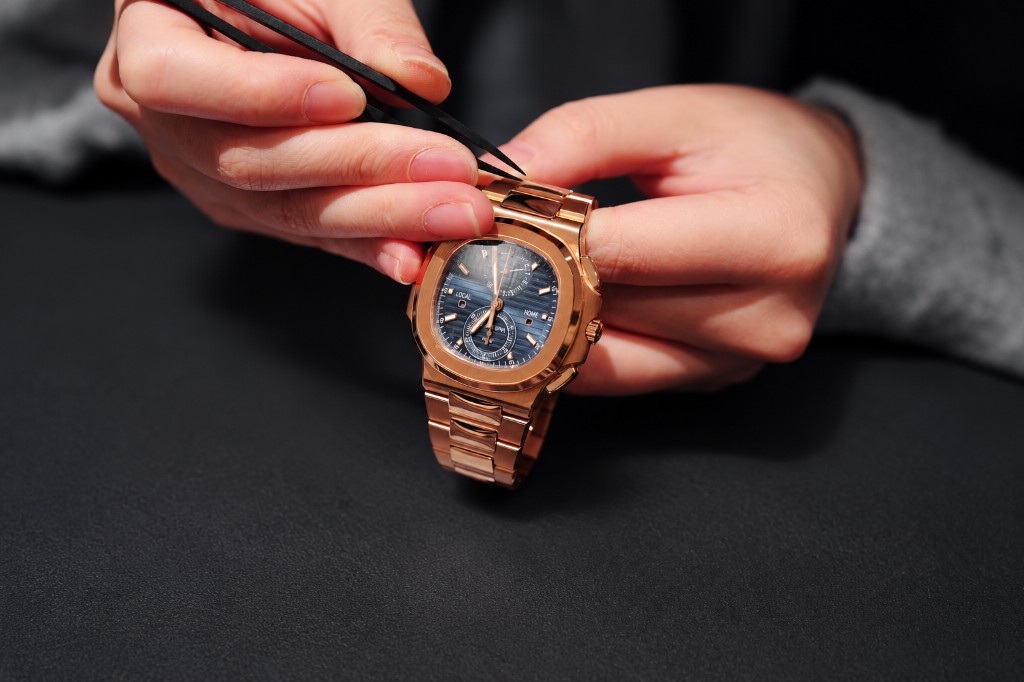 Fitting protection film onto a watch
